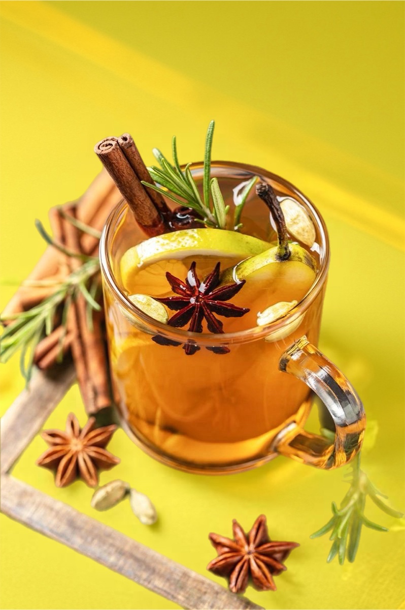 Image of Glass Mug of Tea with Dehydrated Lemon Slices & Star Anise